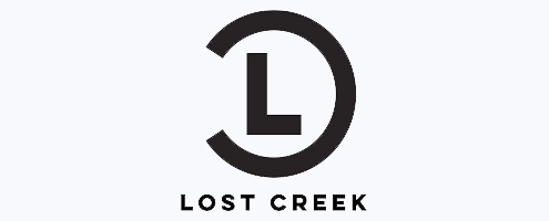 The Lost Creek logo. Lost Creek relies on CannaSpyglass for insights and analytics in the cannabis industry.